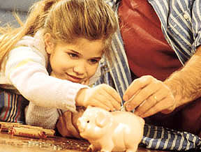 father-young-daughter-money-piggy-bank