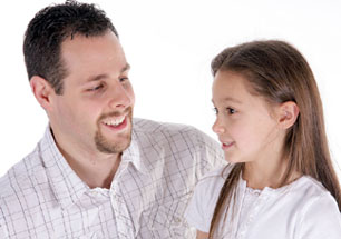 dad-school-age-daughter-talking-smiles