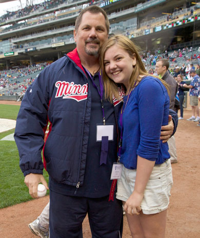 Perry FOY on field with daughter